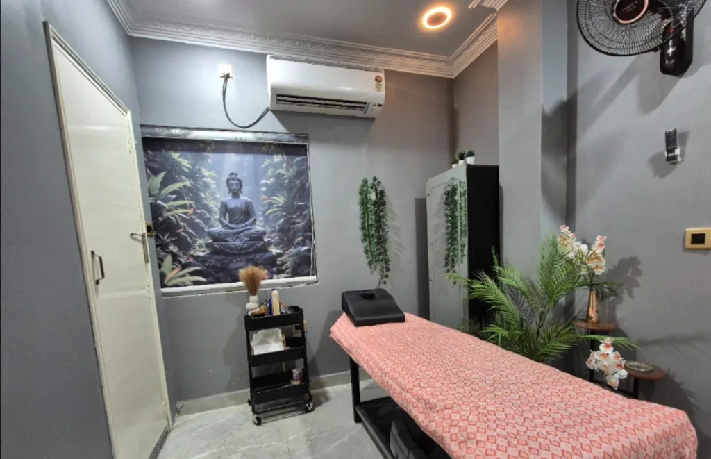 Private massage therapy room at Zoyo Luxury Spa with a clean and comfortable treatment bed.